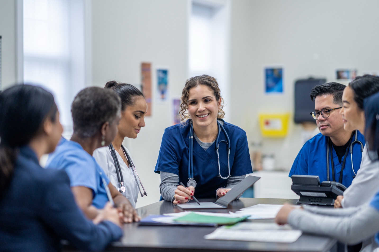A Michigan medical team meeting to plan a practice's billing and credentialing, the kind of local, personal support MMSM brings